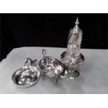 Three items of silver, sugar shaker, milk jug and a pin tray.
