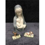 Basil Matthews: two small dog figures together with a Madonna and child by Hertwig