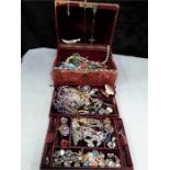 A quantity of costume jewellery including Scottish, Girl Guide badge etc.