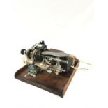 A watch makers lathe by Wolf & John Co. in full working order complete with collets etc.