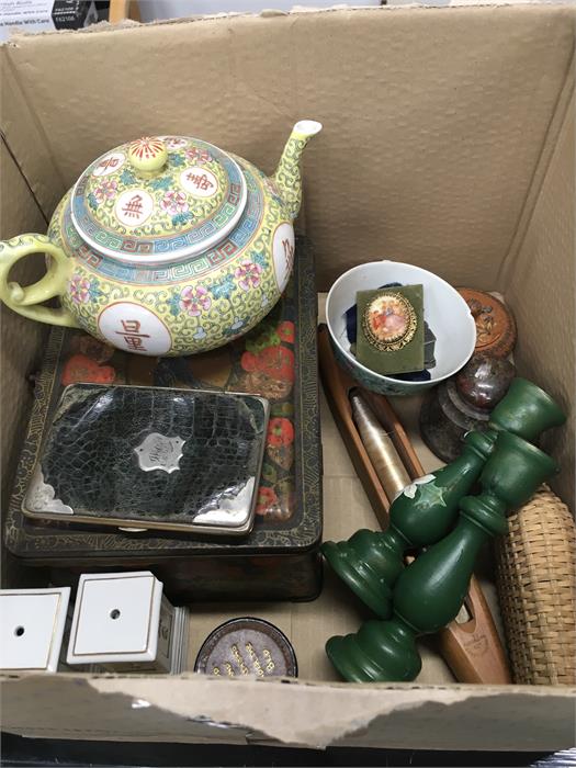 A box of China and other collectibles.