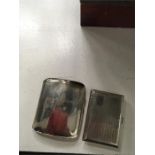 Two silver cigarette cases.