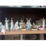 Various ornaments to include Goebel figures and decorative plates.