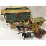 Two model Travellers caravans together with a Whitbread Brewers cart with 3 barrels and 2 horses.