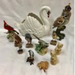 Various collection of 12 bird related ornaments.