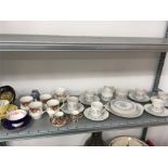 A Royal Doulton six piece teaset in the “Galaxy” pattern together with four pieces of Royal
