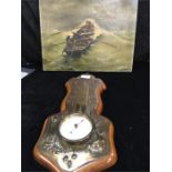 A wall barometer on an oak and brass plaque in the Arts and Crafts style together with an oil on