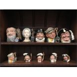 A large quantity of Royal Doulton character jugs to include the three musketeers, trapper,