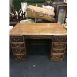 A small oak pedestal desk.