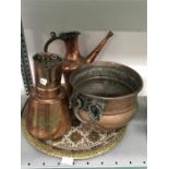 An engraved brass tray and Turkish copper and brass items.