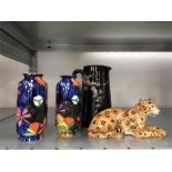 Two pieces of Coronaware china together with a jug and a cheetah.