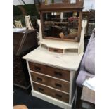 A painted shabby chic chest of three drawers with mirror top.