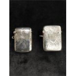 Two silver engraved Vesta cases.