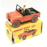 Dinky Toys 340 Land-Rover in orange with green interior, red hubs and tan metal driver figure. G-