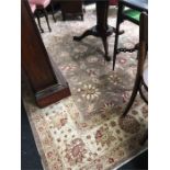 A large all over brown and cream floral medalioned Persian carpet border. and guls