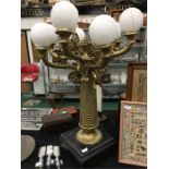 A brass lamp from Peter Stringfellows Nightclub.