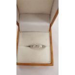 A Platinum 1/2 eternity diamond ring, size L.