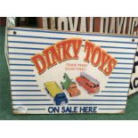 A wooden Dinky Toys sign.