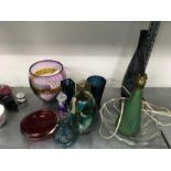 A quantity of mixed coloured glassware to include a Murano lamp, Thomas Petit vase, Mdina glass