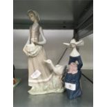 Two Lladro figures of a nun and goose girl.