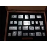 A box of silver Replicas of The Stamps of Royalty. (482 grams).