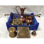 A tray of various brass items to include candlesticks, jugs, bells, horse brasses etc.