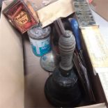 A box of various collectable items to include stamp album, a donkey lighter, tools, a bell and a