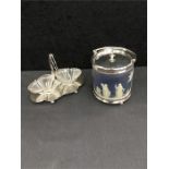 A silver plated pickle dish and a jasper ware biscuit barrel with plated mounts.