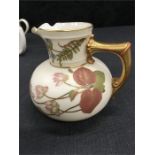 A Royal Worcester small blush ivory jug and eight commemorative mugs and one other.