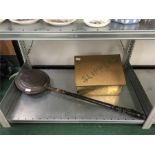 A brass slipper box together with a brass bed warming pan.