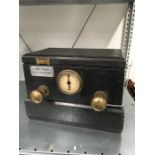 A counter top penny arcade Edwardian electric shock machine. Takes old 1d coin.