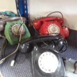 Three retro telephones.