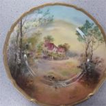 A Royal Doulton decorative plate. "The Inn, Willington, Sussex".