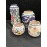 Four traditional pattern pieces of Poole Pottery.