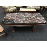 A large marble topped coffee table.