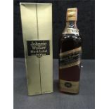 A 750ml bottle of Johnnie Walker Black Label 12 year old blended Scotch Whisky, boxed.