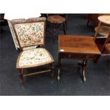 A mahogany table with a chair.