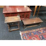 A small wooden table and wooden footstool.