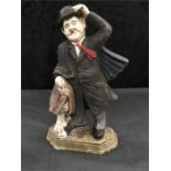 A cast iron doorstop modelled on Oliver Hardy.