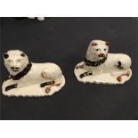Two early creamware lions on scalloped edge bases of hollow form. (6” long x 4” high).