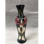 A Moorcroft 8” trial vase in the ‘Crimson Rambler’ pattern designed by R. Bishop inspired by Monet’s