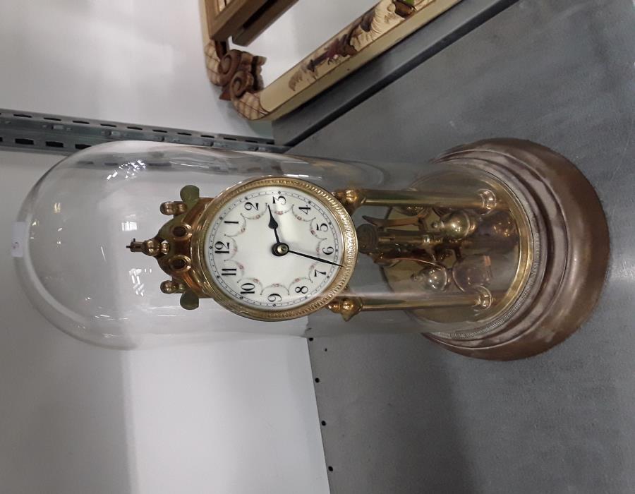 A large brass cased anniversary clock.