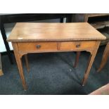 A mahogany two drawer hall table.