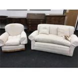 A Victorian two seater sofa, converts to chaise lounge together with armchair upholstered in the