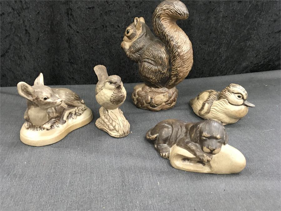 Five Poole Pottery animal figures including a Barbara Linley-Adams squirrel.