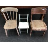 Three assorted small children’s chairs.