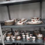 A large collection of Royal Albert Old Country Roses on three shelves. Tea/coffee set and dinner