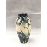 Moorcroft. A trial vase in the ‘Columbia’ pattern. Impressed marks to the base.