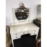 A Victorian white painted dressing table.