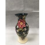 Moorcroft. A vase in the ‘Travellers Joy’ pattern made for the Ceramica Exhibition 2003. Impressed